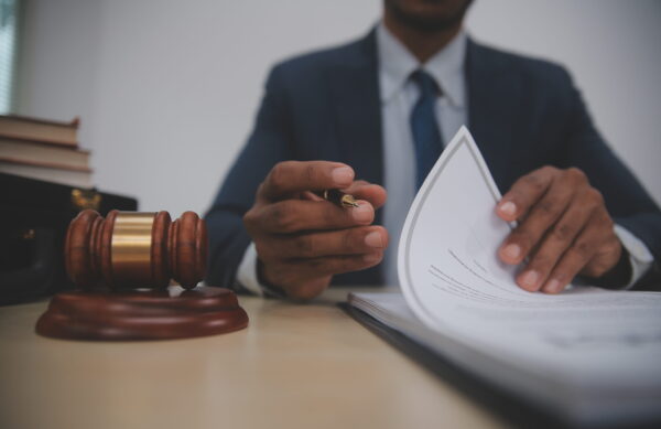 Law theme, gavel or mallet of the judge, lawyer enforcement officers, evidence-based cases taken into account in the court abount business, legislation.